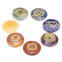 Set Van 7 Ronde Platte Edelstenen Met Goudkleurige Chakrasymbolen