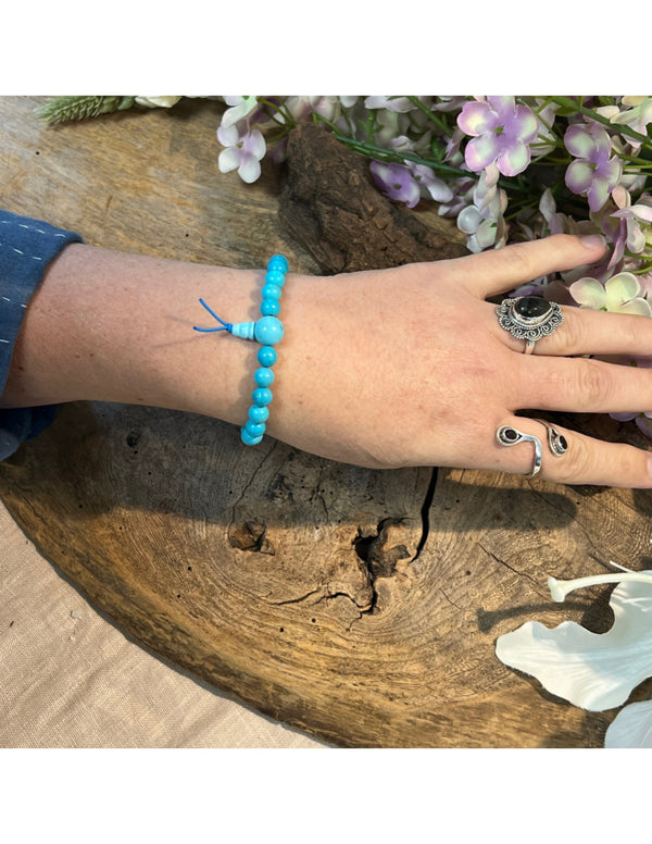 Howliet blauw Turkoois powerbead + kaart (gekleurd)
