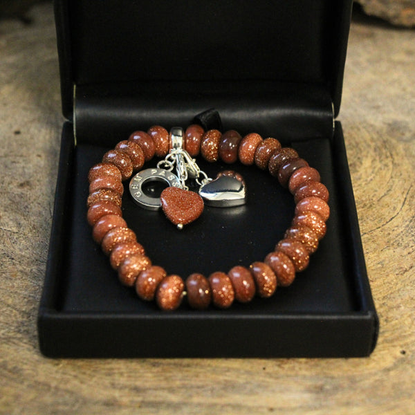 Goldfluss Ruby Mania, armband nr 30, rond (synth)