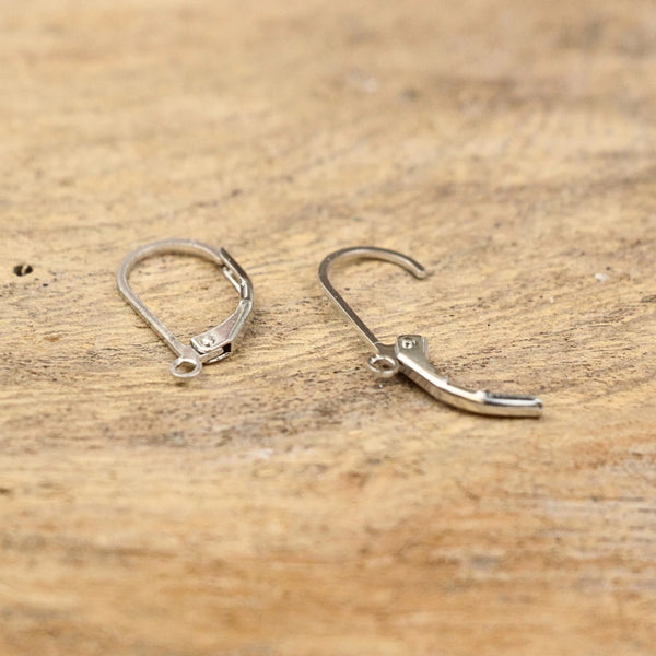 Howliet wit kruis oorbellen - fashion jewelry