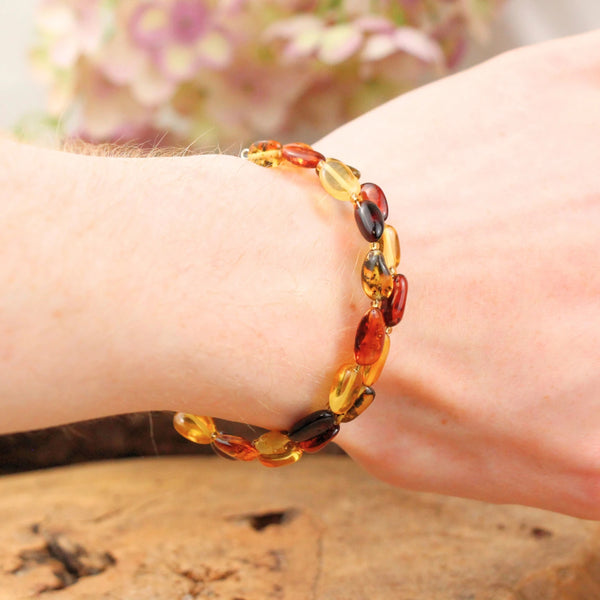 Barnsteen spiraal armband multikleur (Amber)