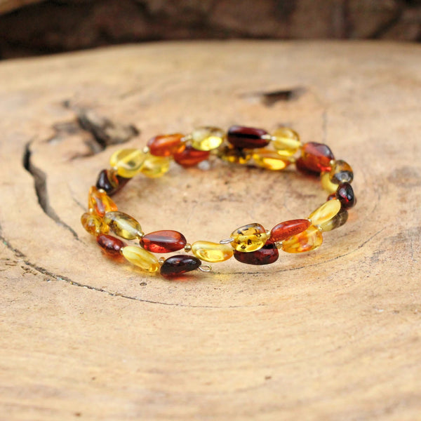 Barnsteen spiraal armband multikleur (Amber)