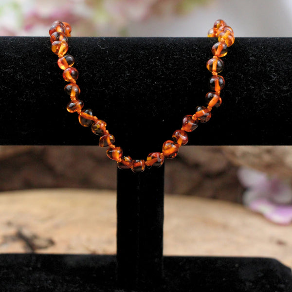 Barnsteen babyketting ronde kralen (Amber)