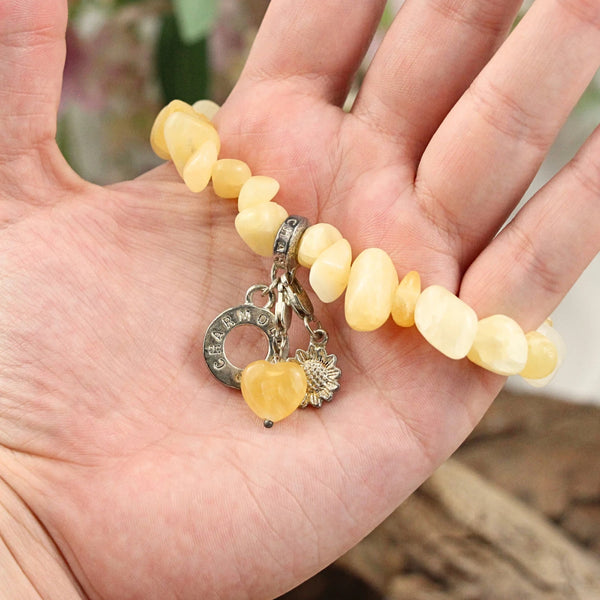 Split armband gele Calciet met bedels