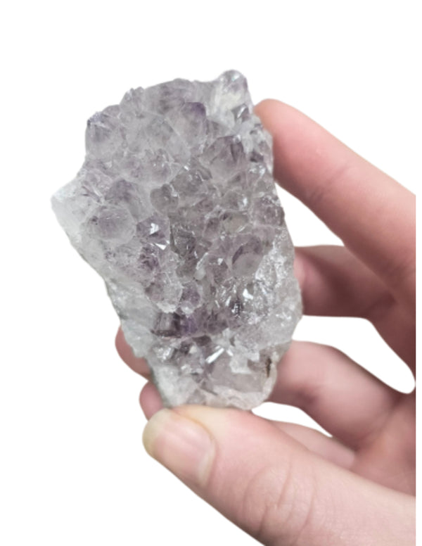 Amethist brokje uit Brazilië uniek en tussen 100-130 gram