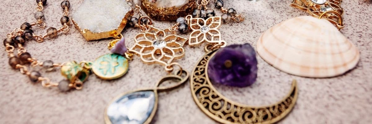 sieraden edelstenen tibetaans armband ketting ring schelp lemniscaat