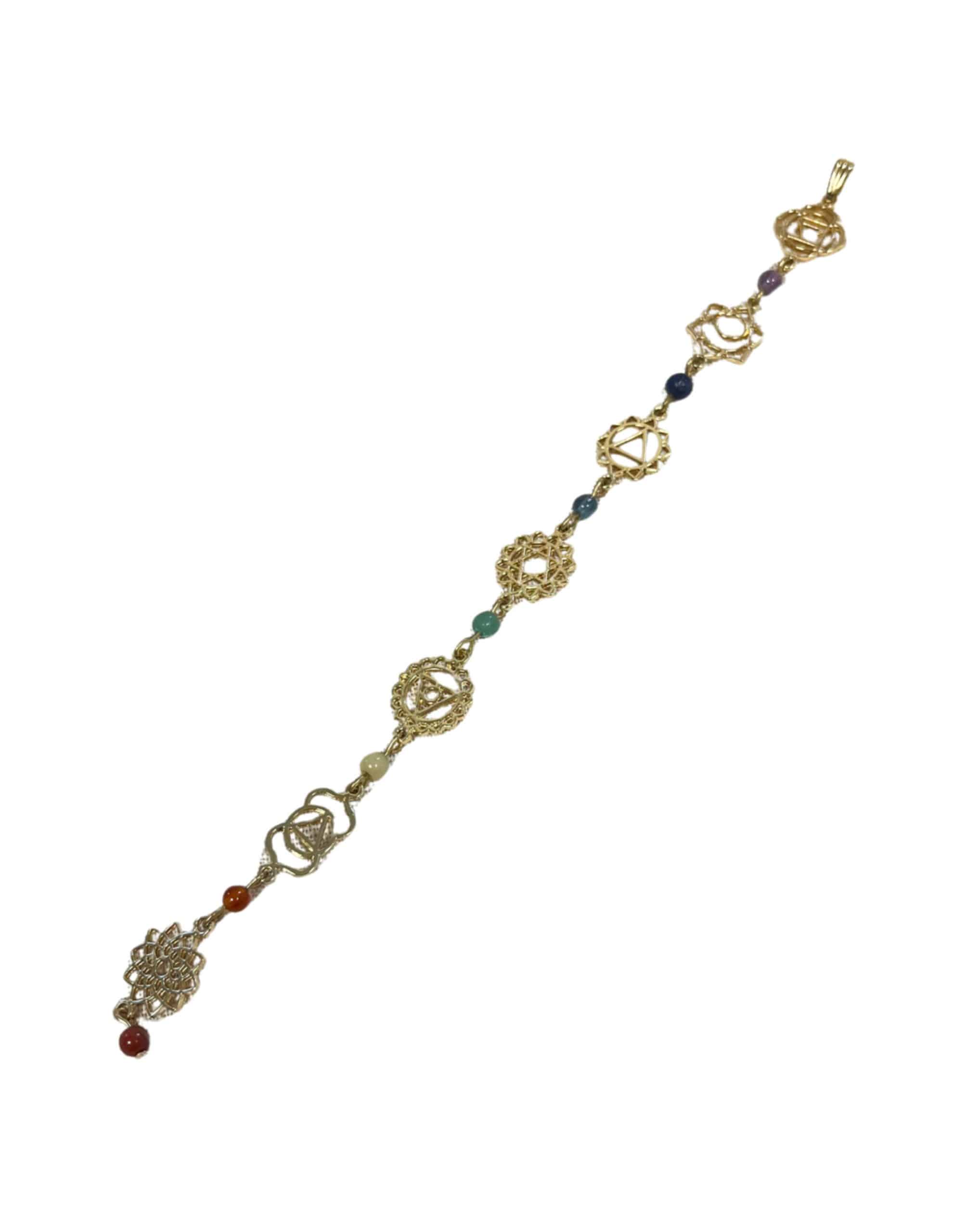 Lange chakra hanger met steentjes goudkleur